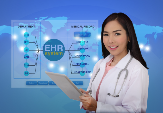 woman holding clip board in front of map screen and graph